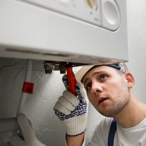 worker-repairing-water-heater (6)